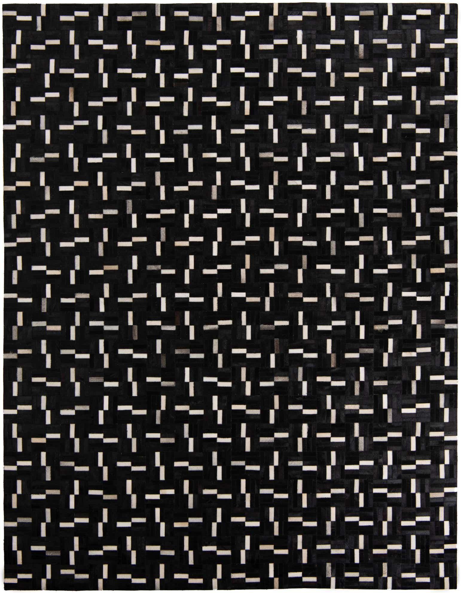 A rectangular 8x10 black cowhide rug with a modern abstract pattern of small white and grey rectangular leather pieces.