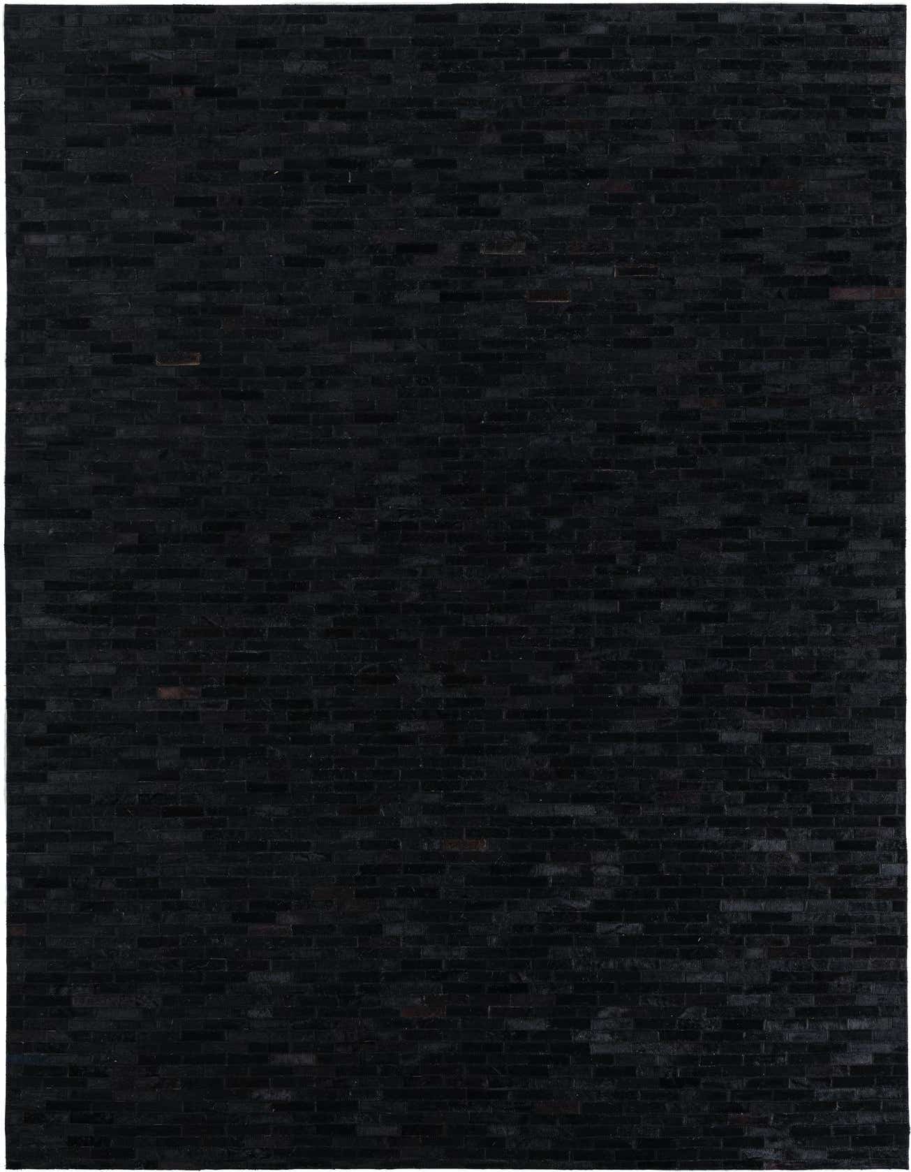 A 5x8 rectangular black cowhide leather rug with a subtle striped modern pattern, suitable for a living room.