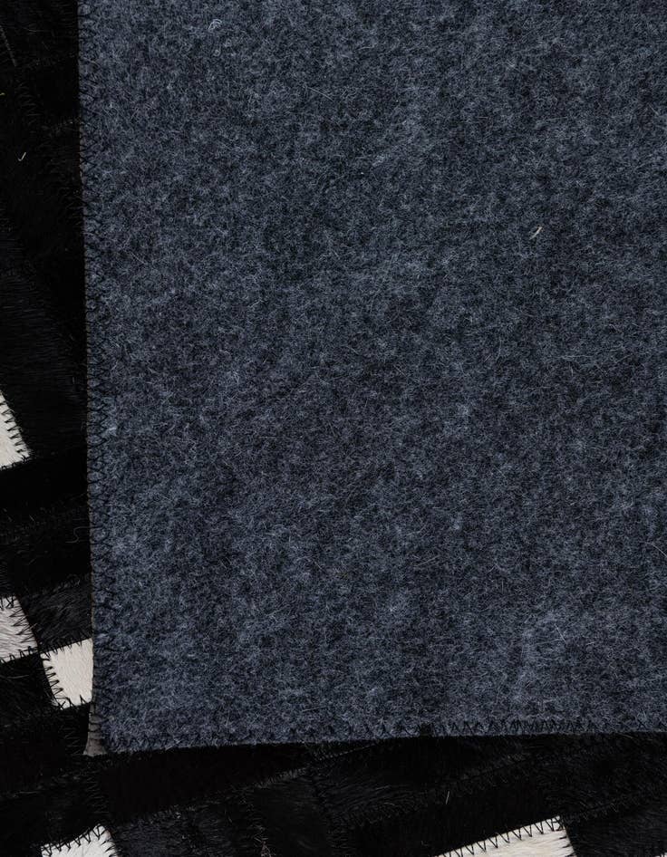 Detail image of  5' 2 x 8' 2 Cowhide Leather Rug