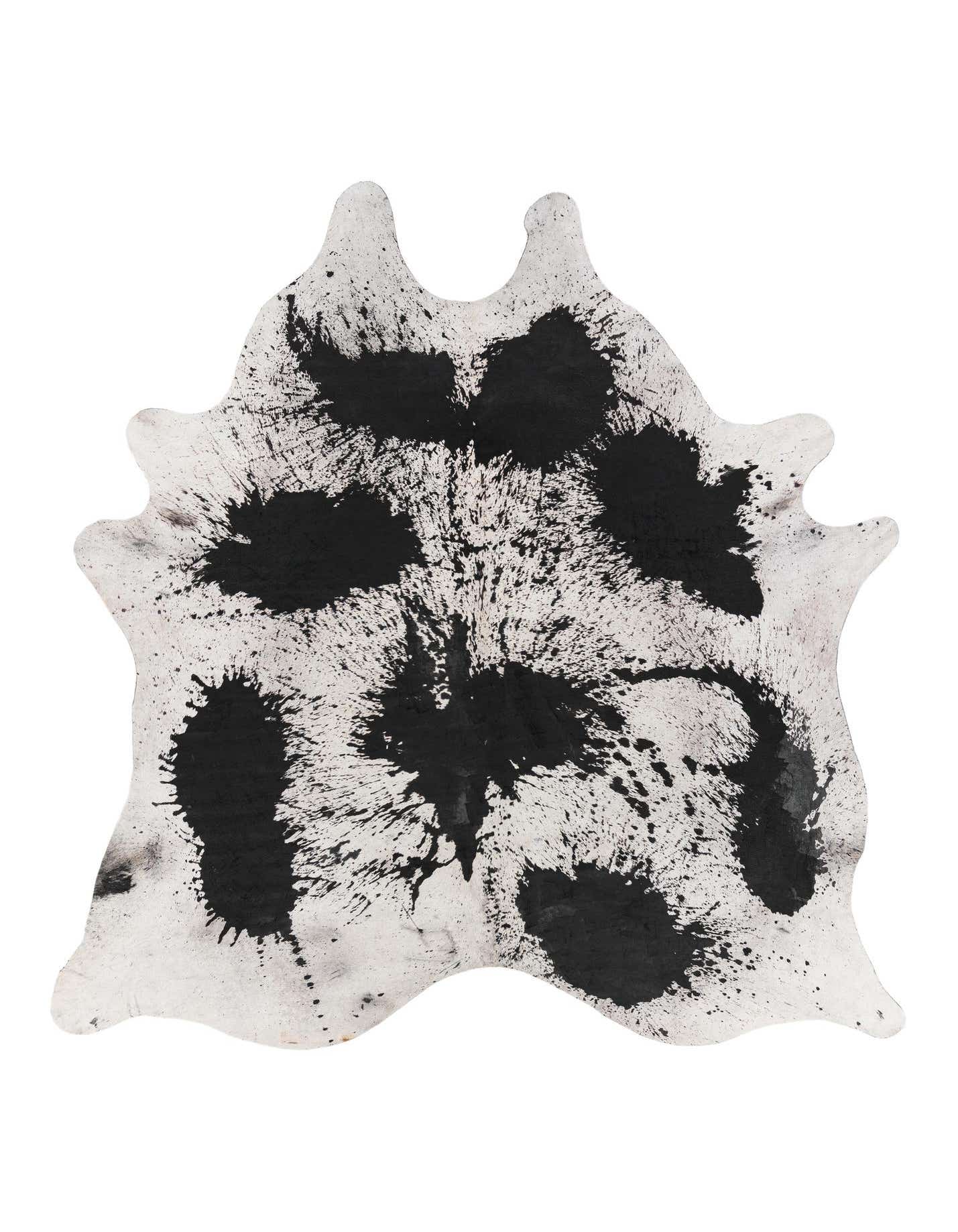 A 6x9 rectangular cowhide rug with a modern black splatter paint pattern on a white background.