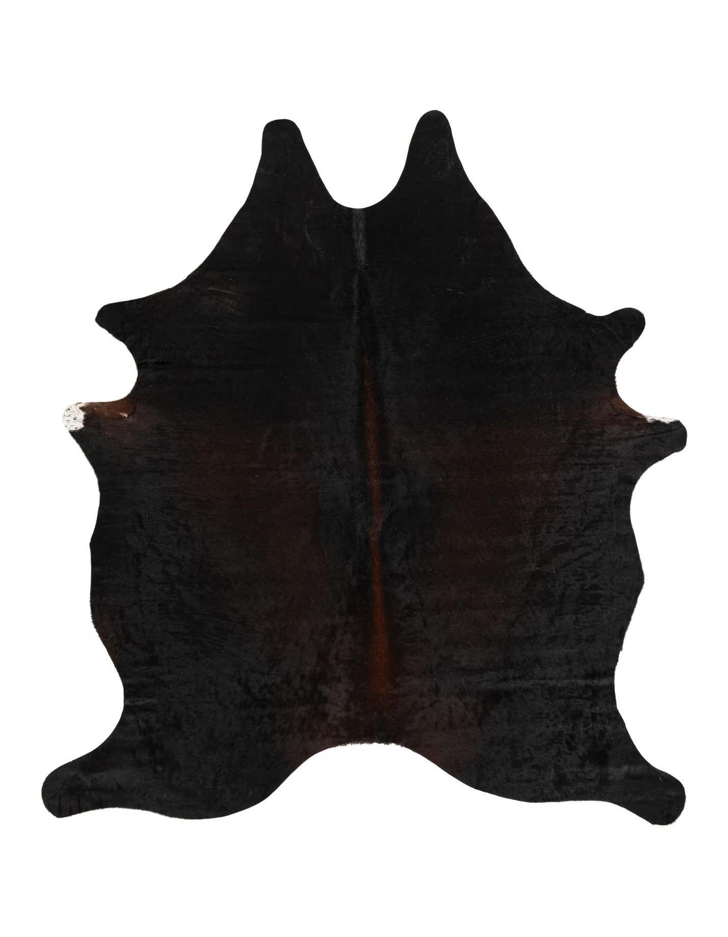 A 5x7 black cowhide rug with a natural, irregular shape and subtle brown undertones, ideal for a modern living space.