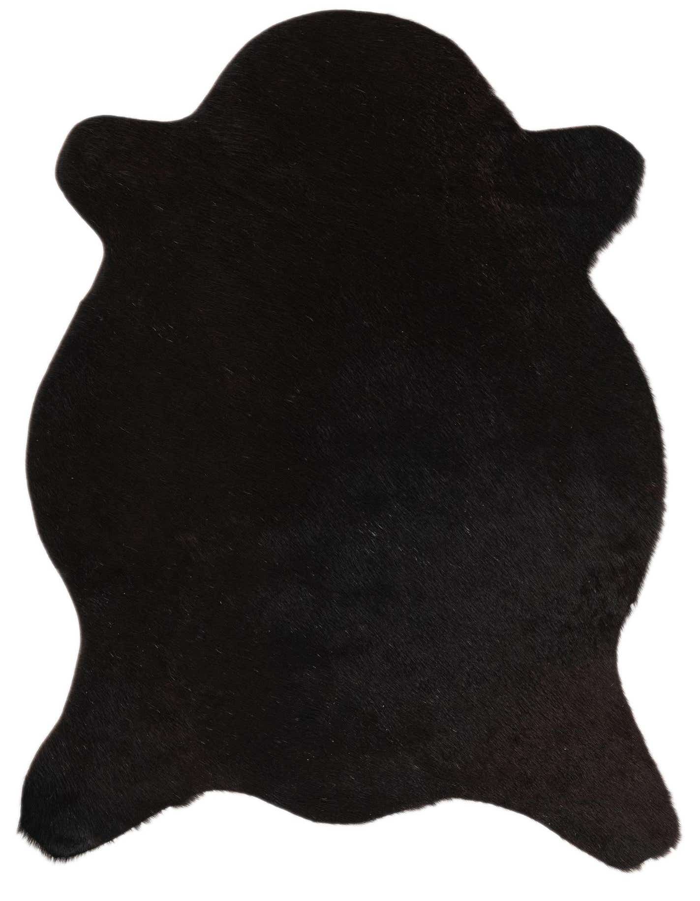 A 2x3 black cowhide rug with an organic, irregular shape, showcasing its sleek, flat texture.