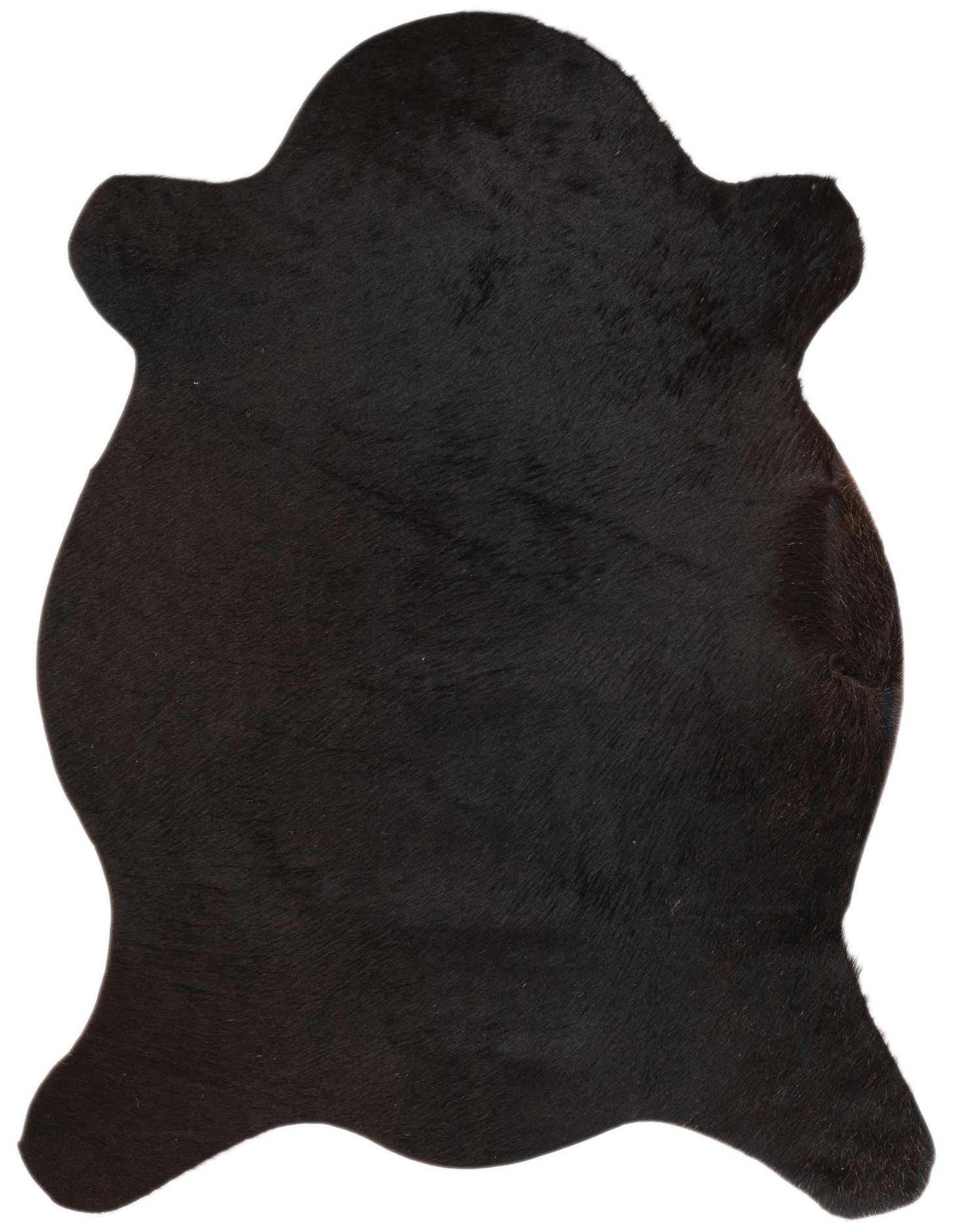 A 2x3 black cowhide rug with an irregular, natural shape, showcasing its textured, flat pile.