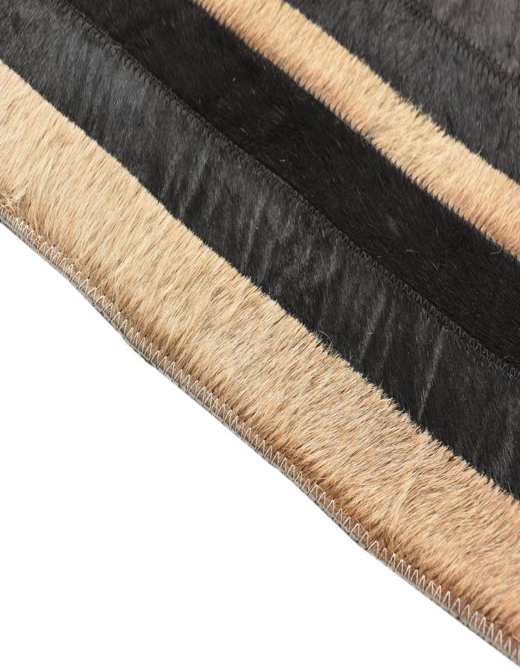 Detail image of  5' 3 x 7' 6 Cowhide Rug