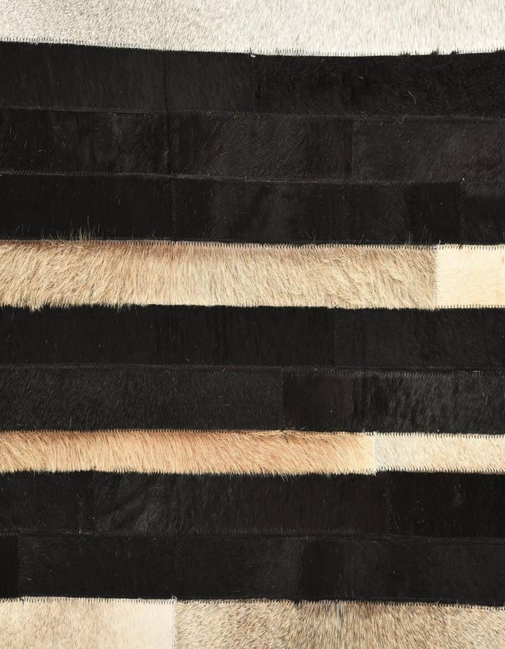 Detail image of  5' 3 x 7' 6 Cowhide Rug