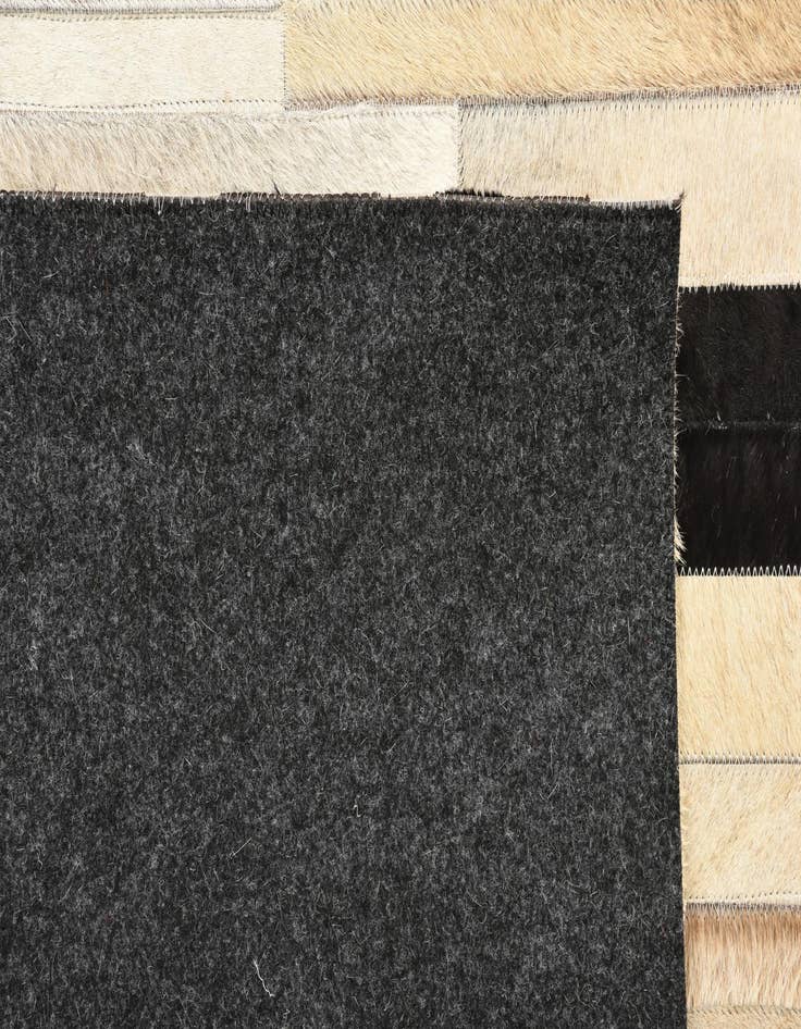 Detail image of  5' 3 x 7' 6 Cowhide Rug