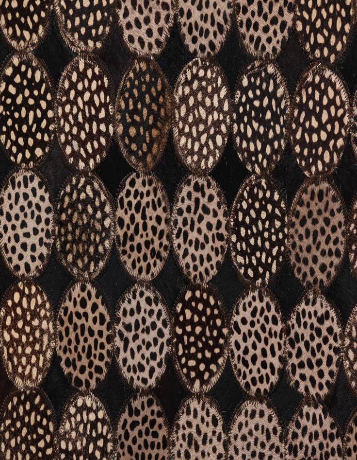 Detail image of  5' 2 x 7' 6 Cowhide Rug