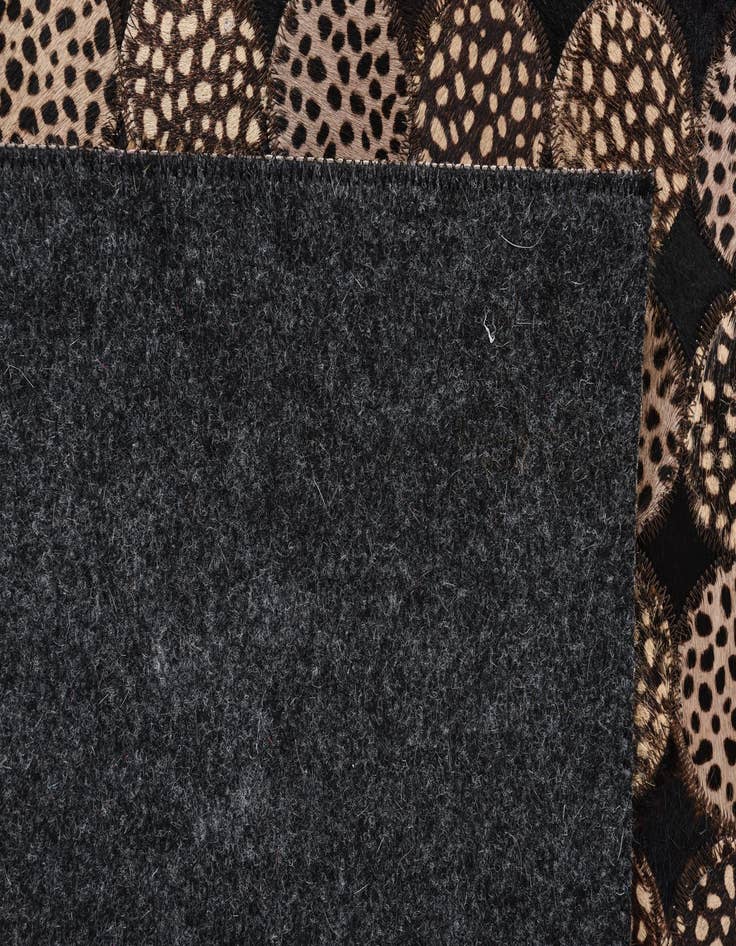 Detail image of  5' 2 x 7' 6 Cowhide Rug