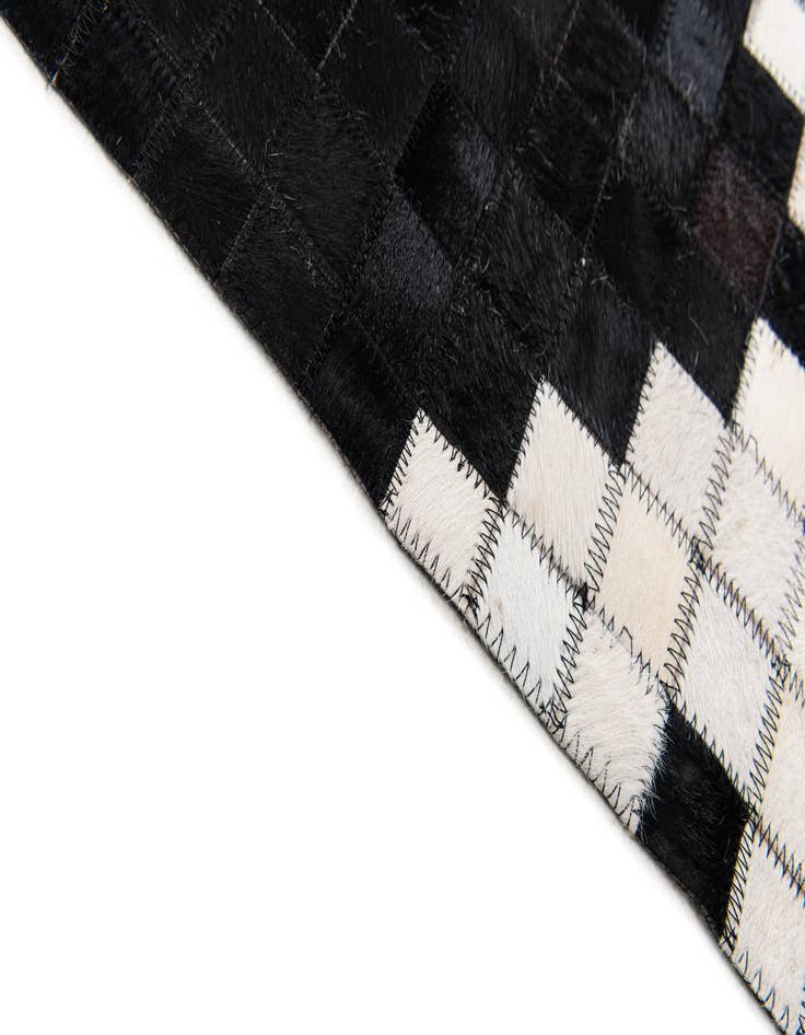 Detail image of  8' 2 x 9' 11 Cowhide Stocks Rug