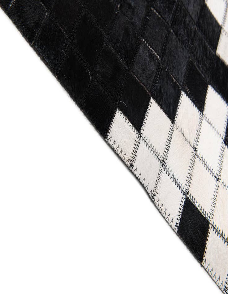 Detail image of  8' 2 x 10' Cowhide Stocks Rug