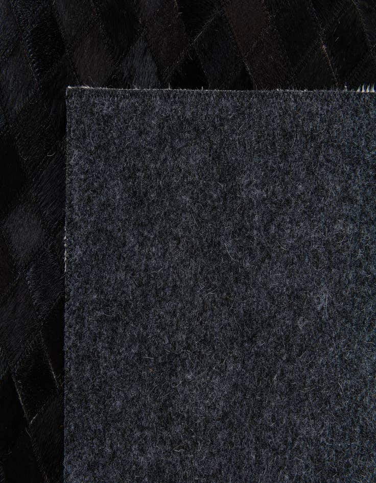 Detail image of  8' 2 x 10' Cowhide Stocks Rug