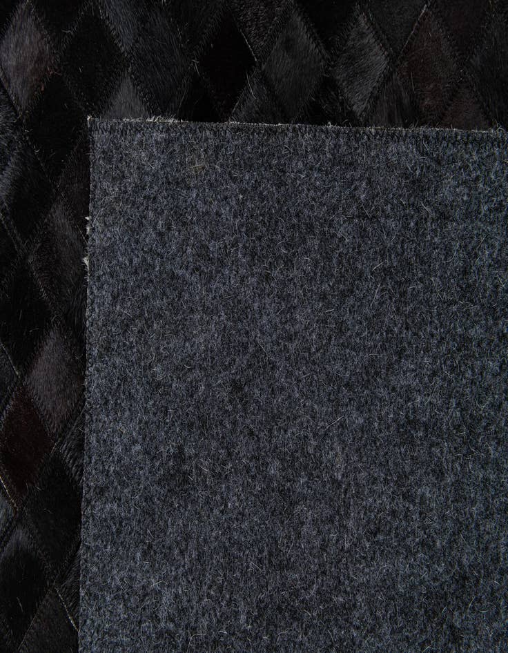 Detail image of  8' 2 x 10' Cowhide Stocks Rug