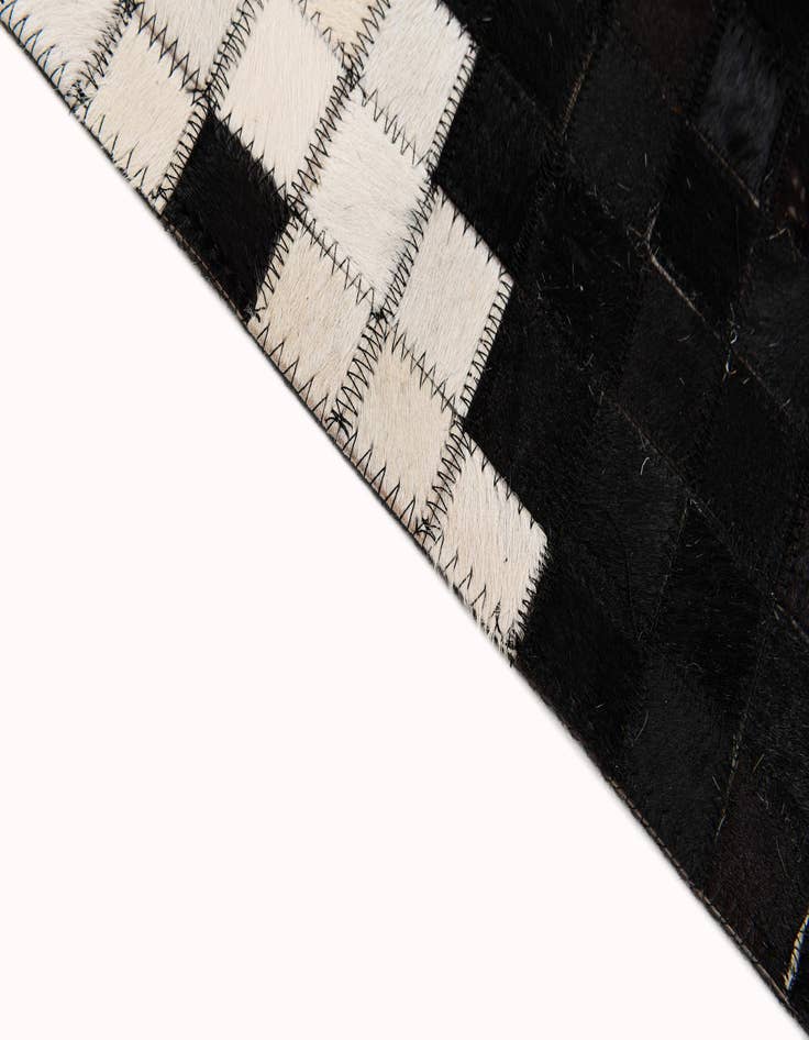 Detail image of  8' 2 x 10' Cowhide Stocks Rug