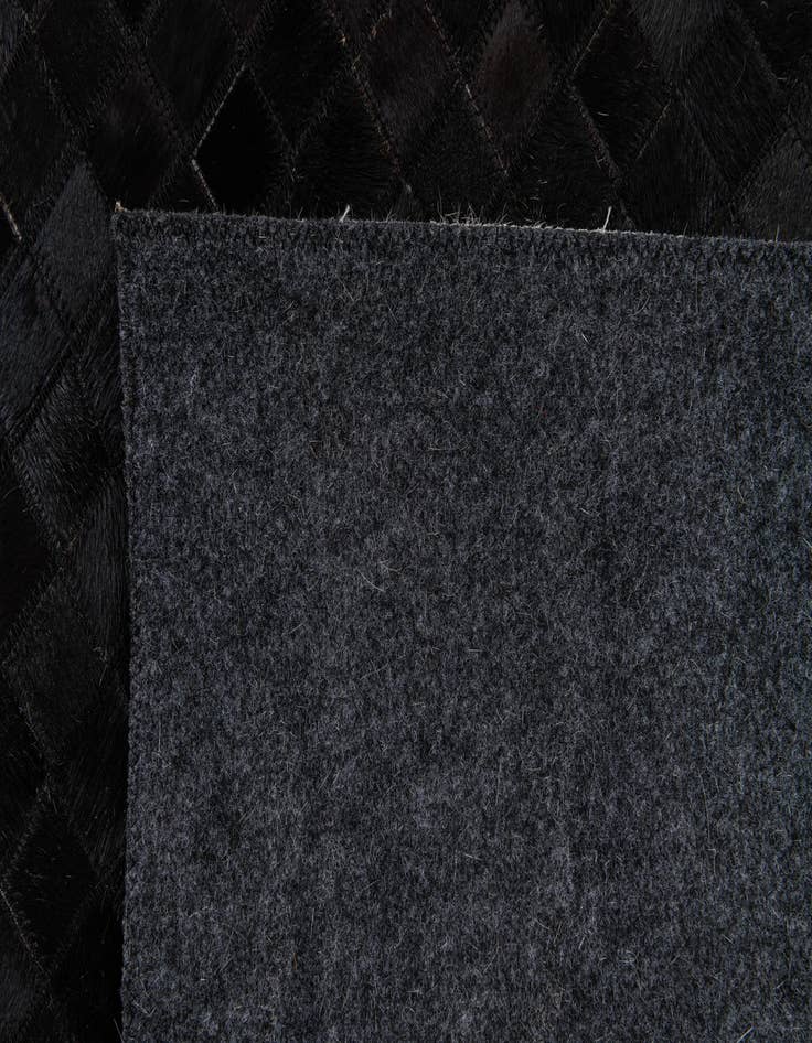 Detail image of  8' 2 x 10' Cowhide Stocks Rug