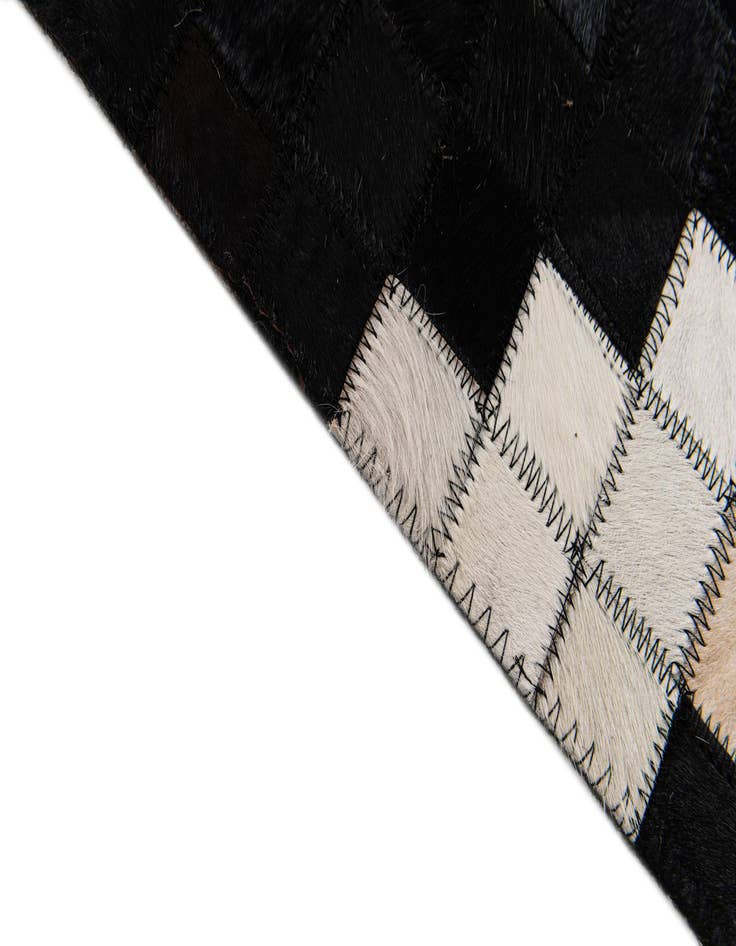 Detail image of  8' 2 x 9' 11 Cowhide Stocks Rug