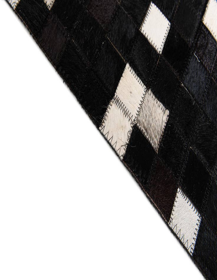 Detail image of  7' 11 x 9' 10 Cowhide Stocks Rug