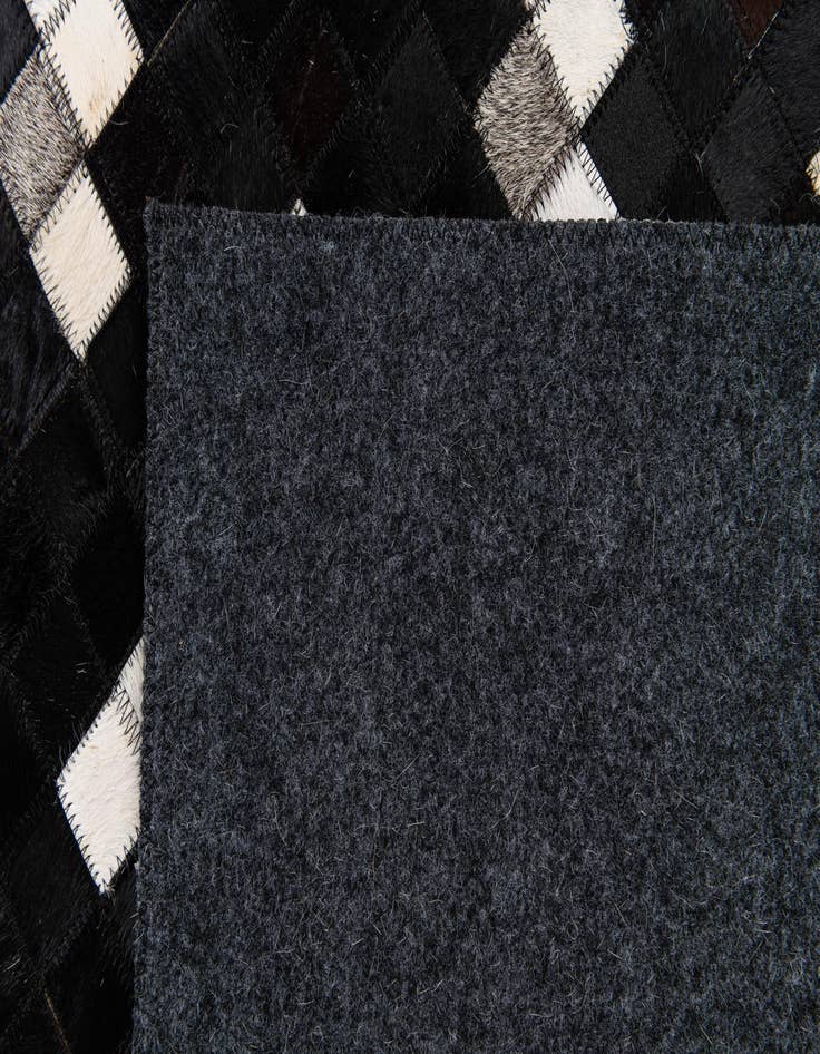 Detail image of  7' 11 x 9' 10 Cowhide Stocks Rug