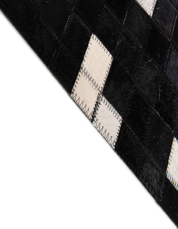 Detail image of  7' 11 x 9' 10 Cowhide Stocks Rug