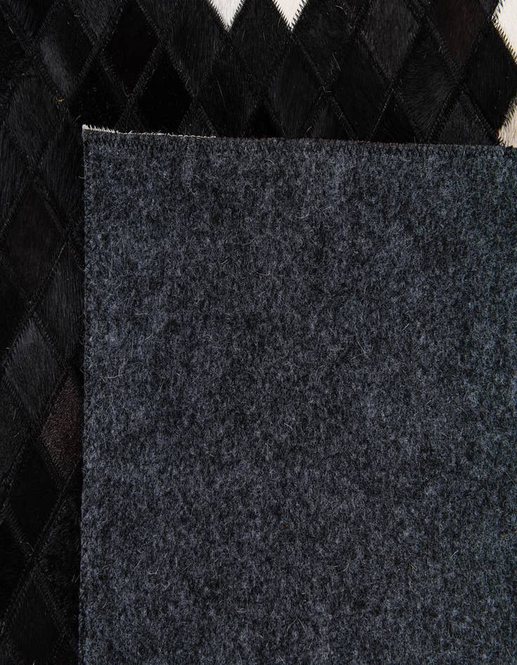 Detail image of  7' 11 x 9' 8 Cowhide Stocks Rug