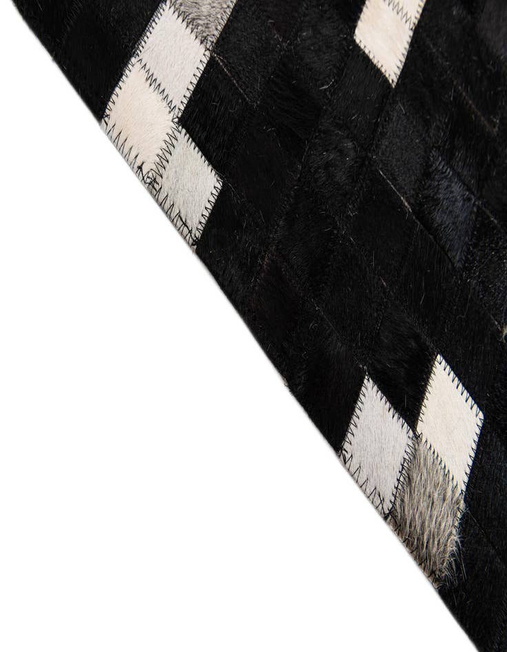 Detail image of  7' 11 x 9' 10 Cowhide Stocks Rug