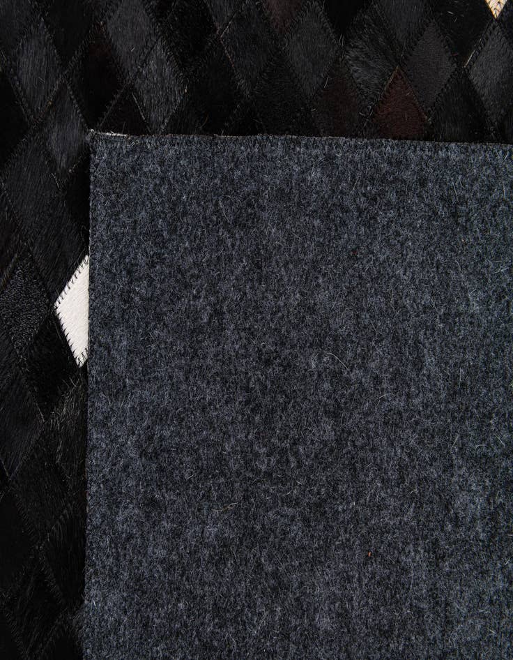 Detail image of  7' 11 x 9' 10 Cowhide Stocks Rug