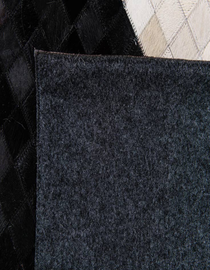 Detail image of  8' 1 x 9' 11 Cowhide Stocks Rug