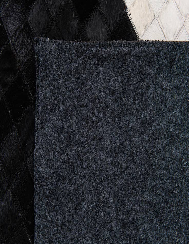 Detail image of  8' 1 x 10' Cowhide Stocks Rug