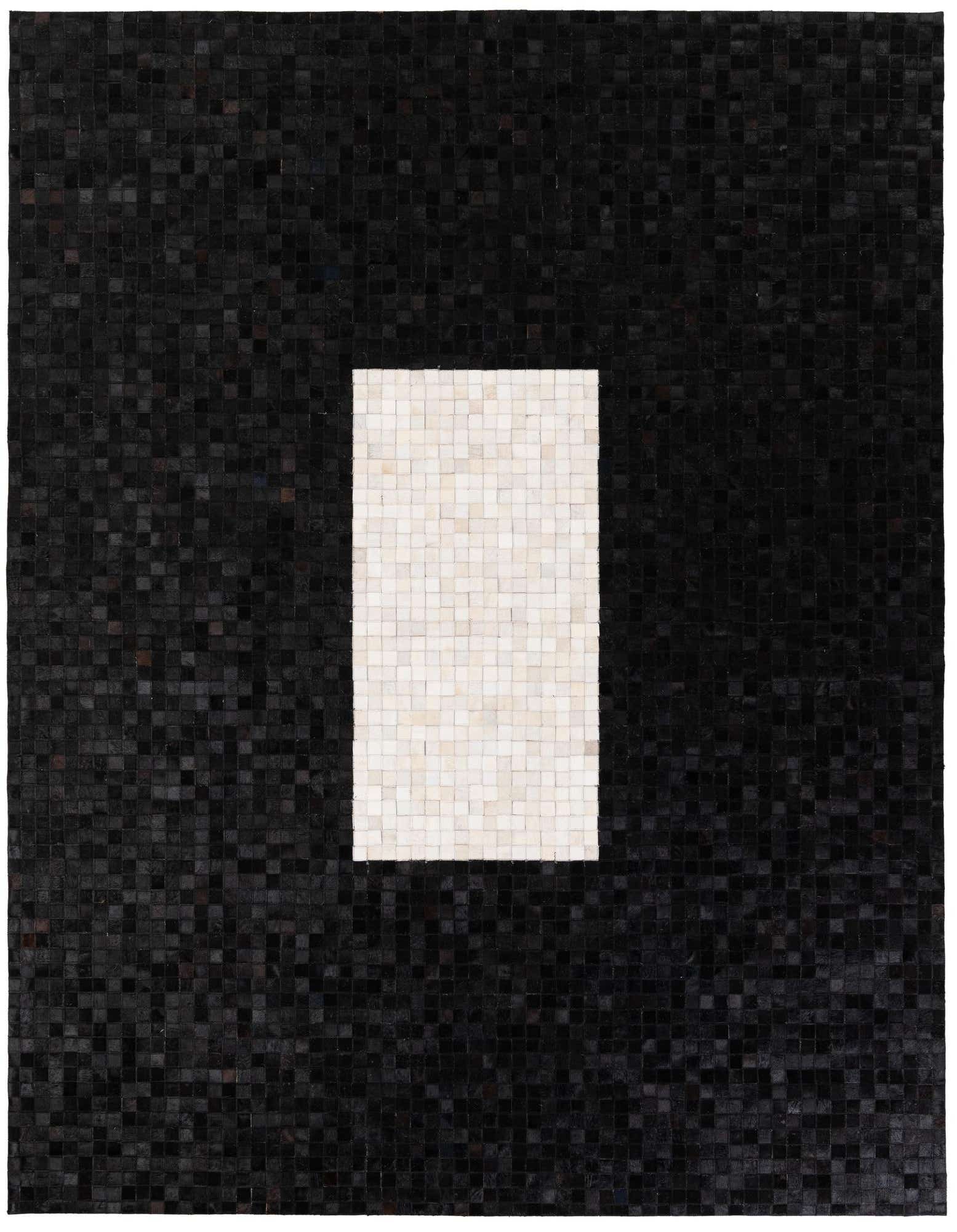 A modern 8x10 rectangular rug made of black and white cowhide squares, featuring a large white rectangle in the center.
