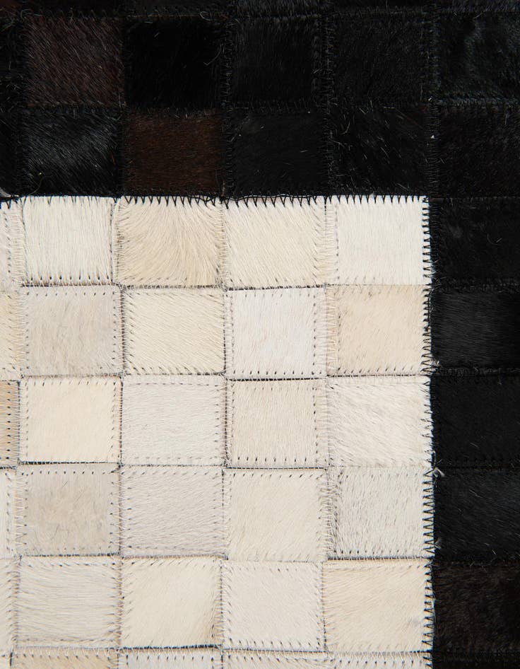 Detail image of  8' 2 x 10' Cowhide Stocks Rug