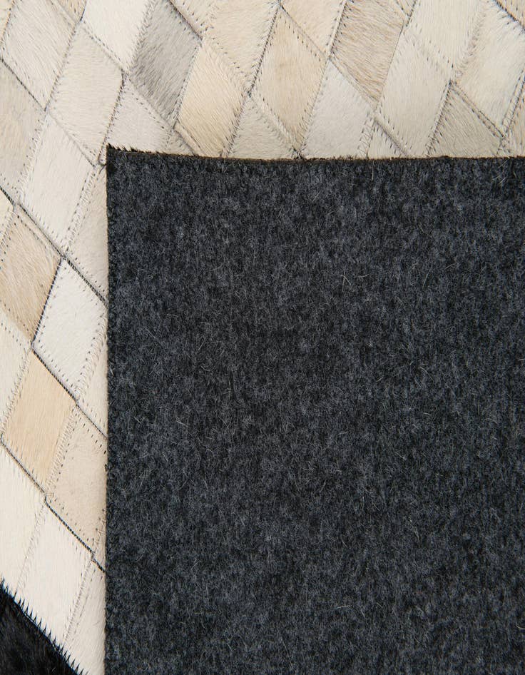 Detail image of  8' 2 x 10' Cowhide Stocks Rug
