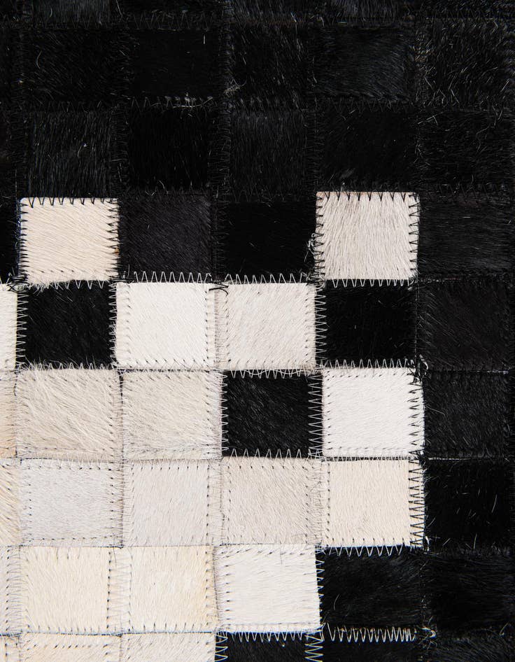 Detail image of  8' 2 x 10' Cowhide Stocks Rug