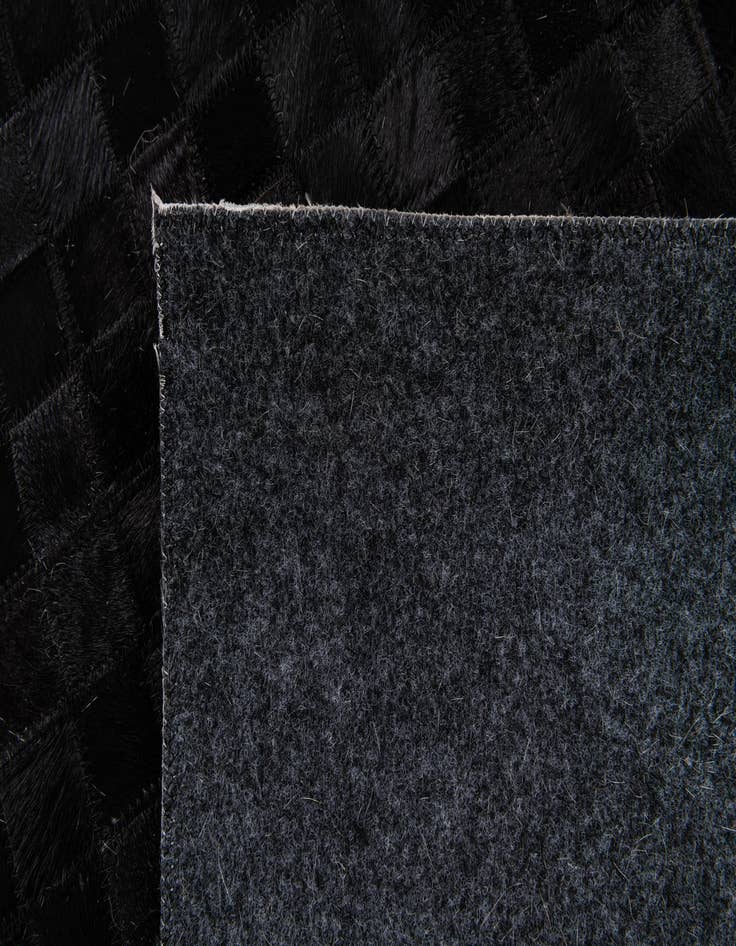 Detail image of  8' 2 x 10' Cowhide Stocks Rug