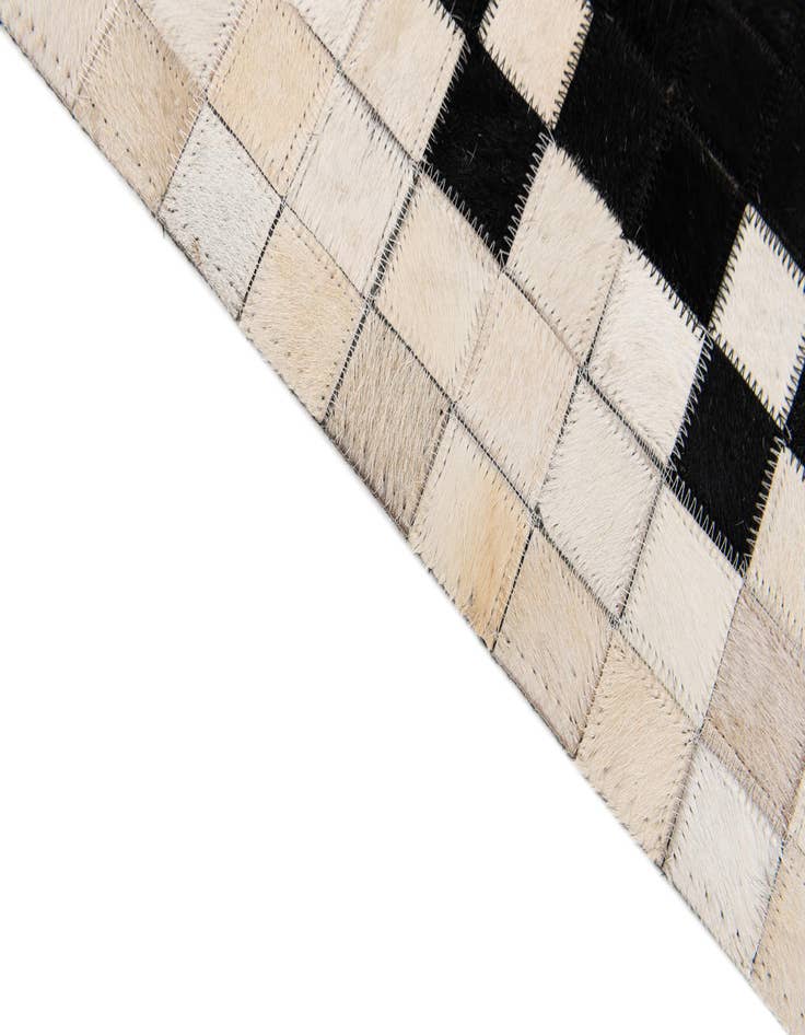 Detail image of  8' x 10' 3 Cowhide Stocks Rug