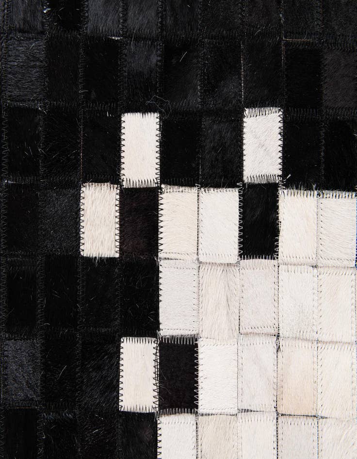 Detail image of  8' x 10' 3 Cowhide Stocks Rug