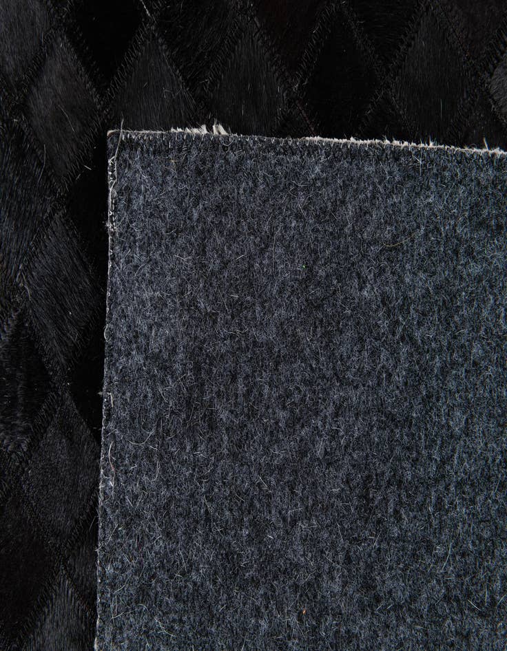 Detail image of  8' x 10' 3 Cowhide Stocks Rug