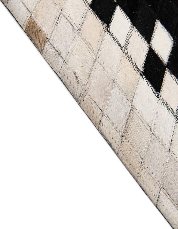 Detail image of  8' 2 x 9' 11 Cowhide Stocks Rug