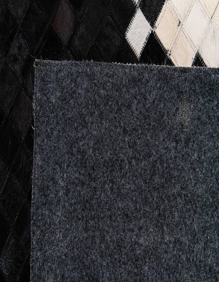 Detail image of  8' 2 x 9' 11 Cowhide Stocks Rug