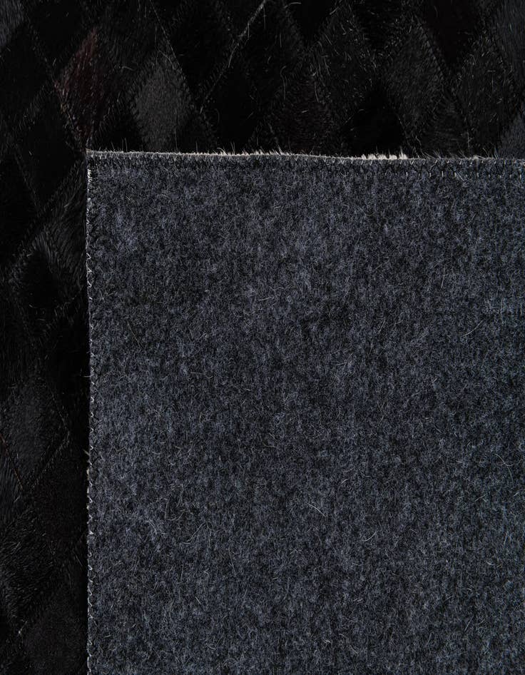 Detail image of  8' x 9' 9 Cowhide Stocks Rug