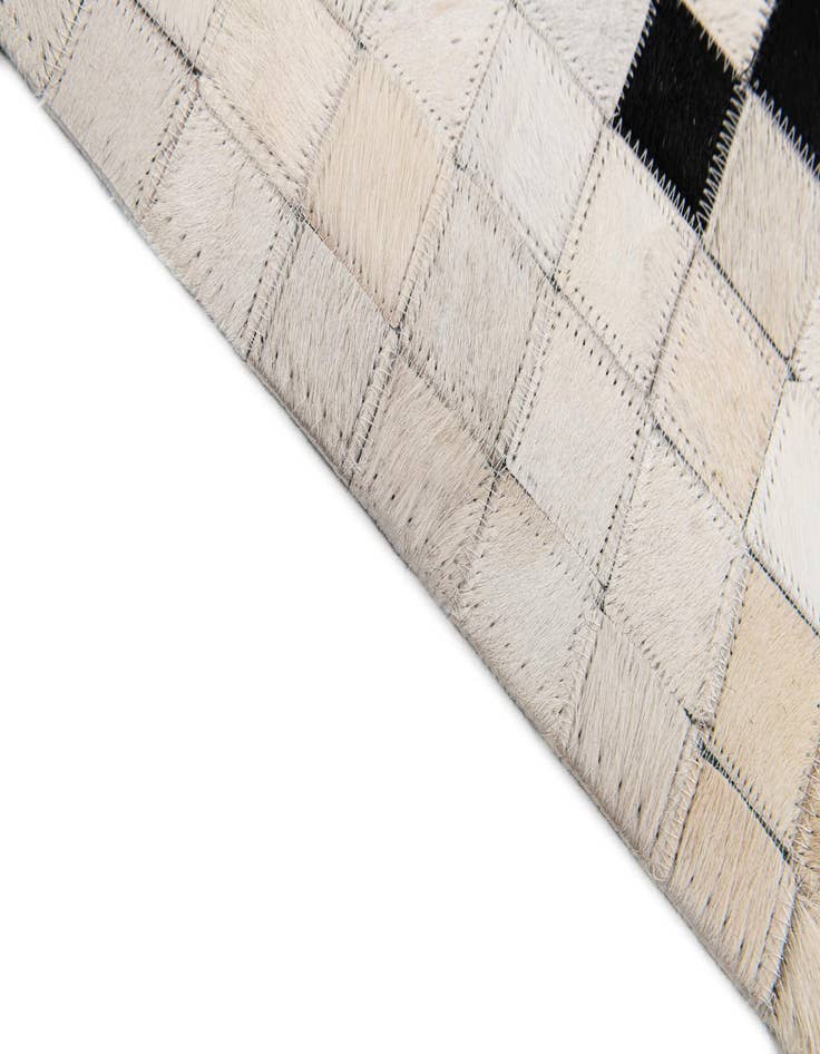 Detail image of  8' 2 x 9' 11 Cowhide Stocks Rug