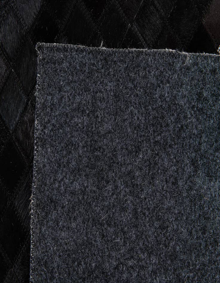 Detail image of  8' 2 x 9' 11 Cowhide Stocks Rug