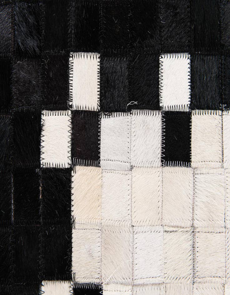 Detail image of  8' 1 x 9' 11 Cowhide Stocks Rug