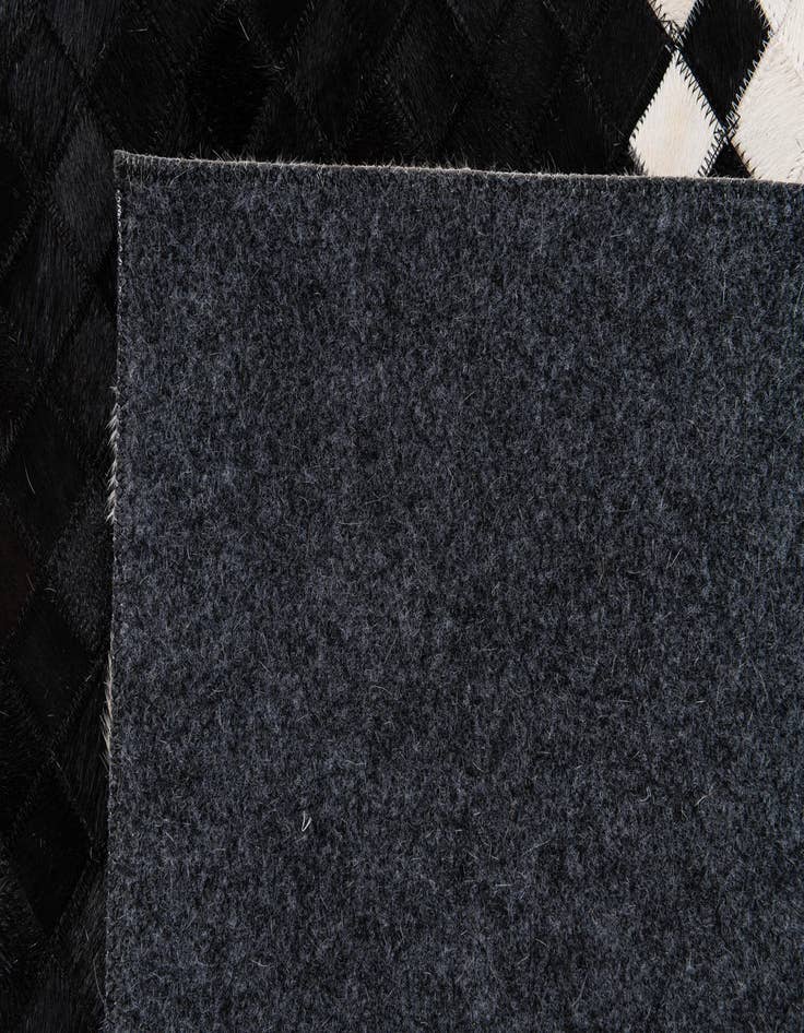 Detail image of  8' 1 x 9' 11 Cowhide Stocks Rug