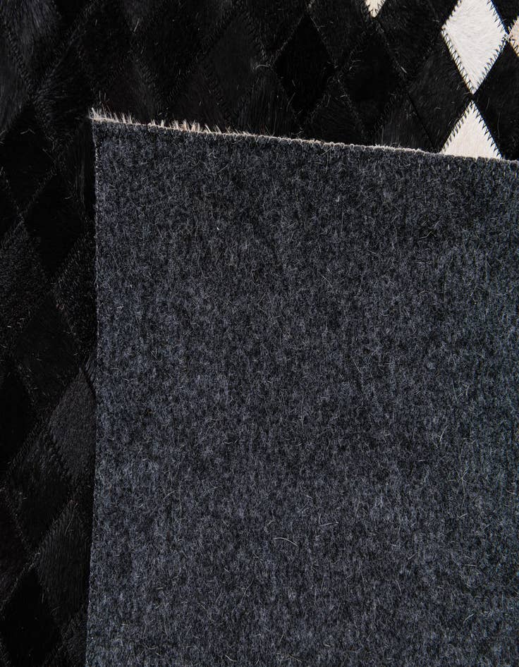 Detail image of  8' 1 x 10' 1 Cowhide Stocks Rug