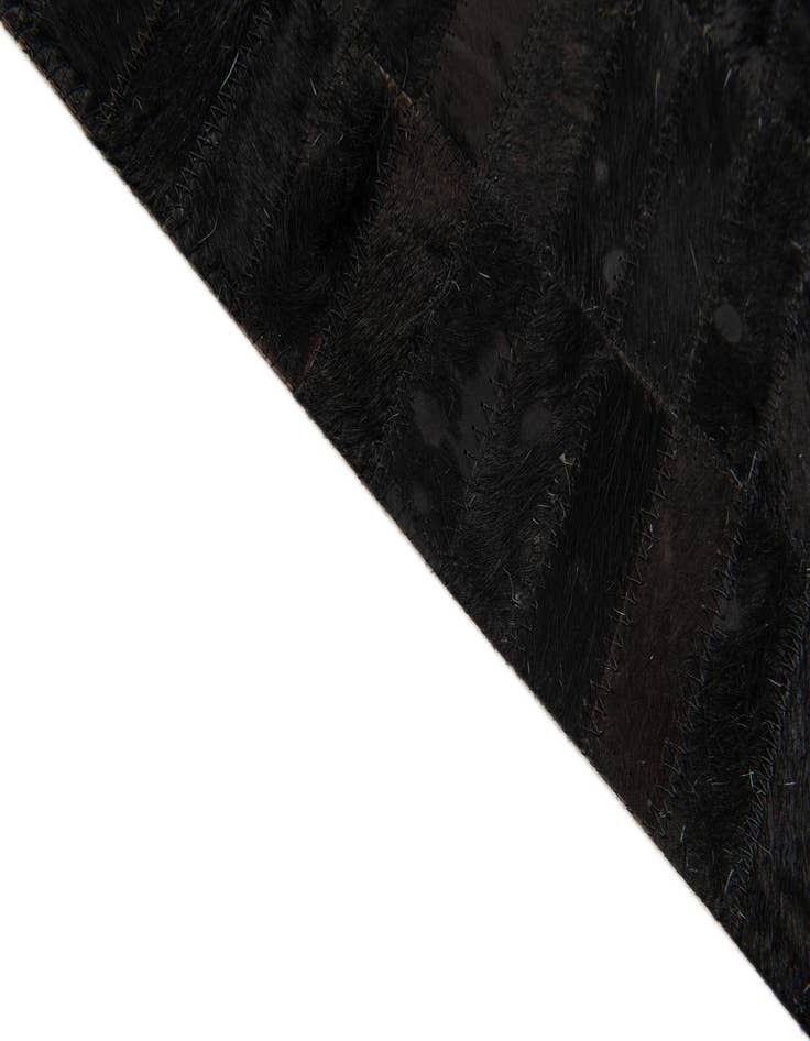 Detail image of  6' x 8' 11 Cowhide Stocks Rug