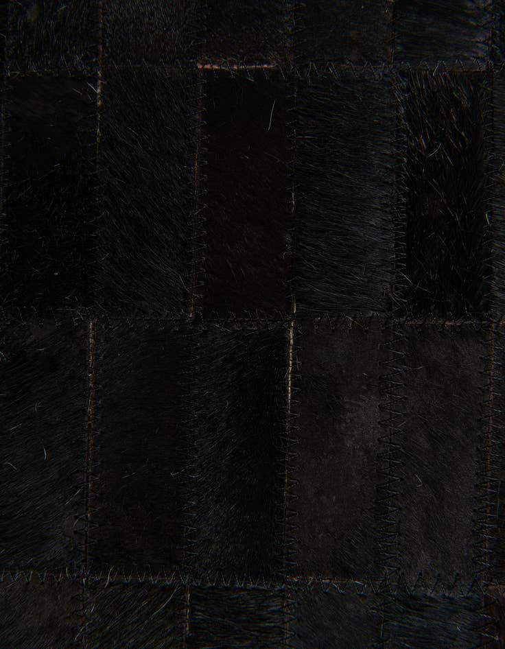 Detail image of  6' x 8' 11 Cowhide Stocks Rug