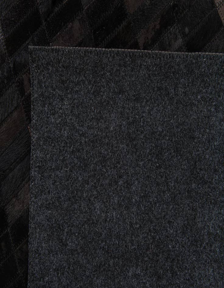 Detail image of  6' x 8' 11 Cowhide Stocks Rug