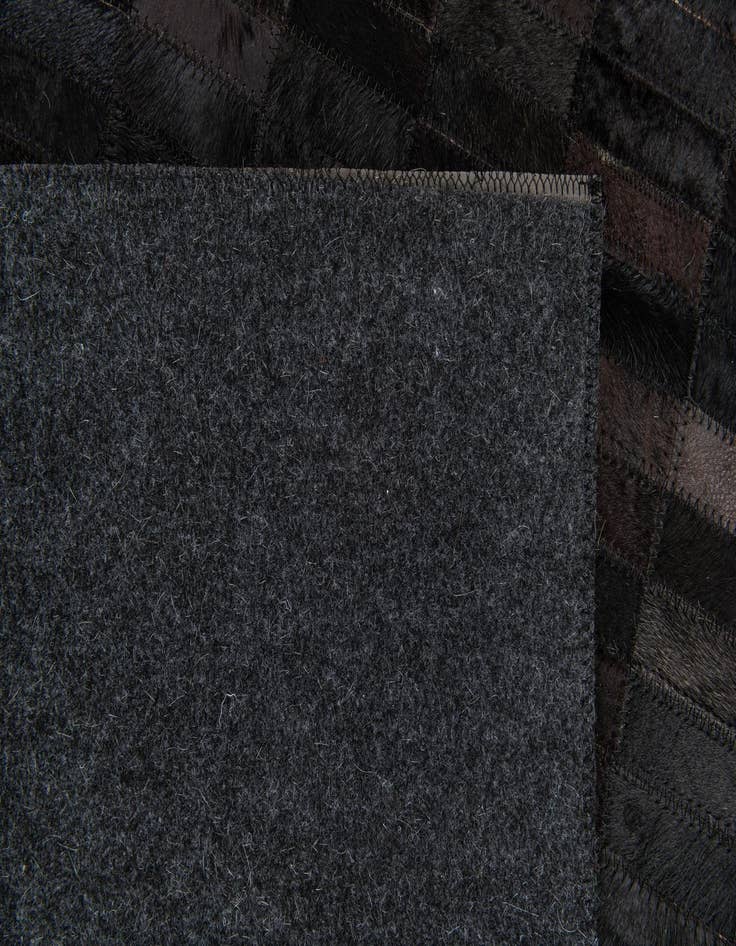 Detail image of  6' x 9' Cowhide Stocks Rug