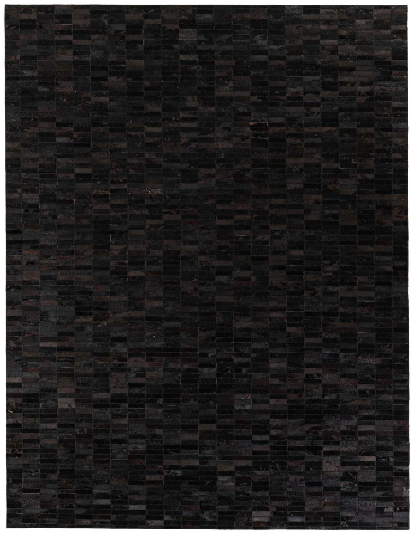 A 6x9 rectangular black modern cowhide rug with a striped pattern, perfect for a living room or office.