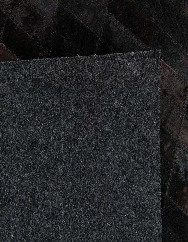 Detail image of  6' x 9' Cowhide Stocks Rug