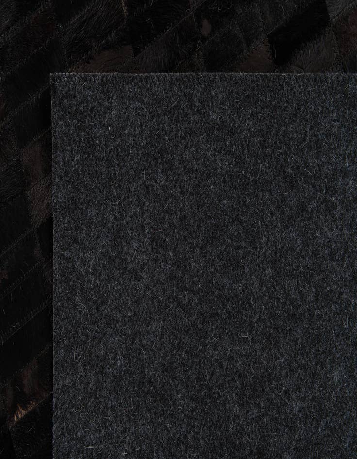 Detail image of  5' 11 x 9' Cowhide Stocks Rug